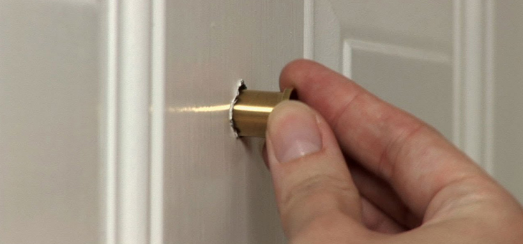 peephole door repair in Three Lakes